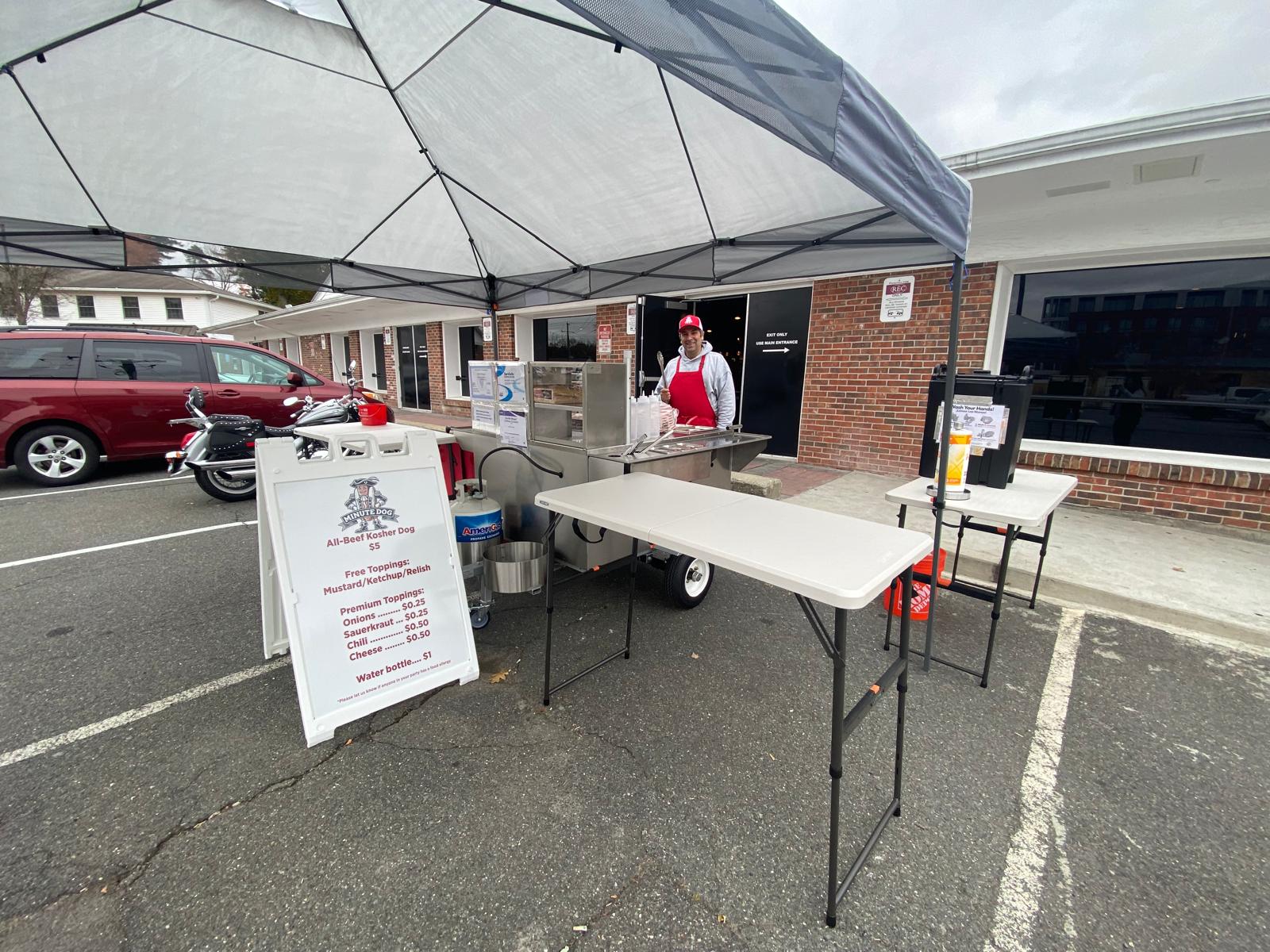 Minute Dog hot dog cart set up for service in Amherst